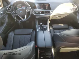 2023 BMW X5 sDrive40i with VIN 5UXCR4C06P9P01409, listed as a Copart auction lot 43127395 with 27,564 mi miles and Salvage Title. Bid and sale history available at carsss.com. Image 8.