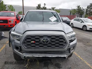 2021 Toyota Tacoma SR z VIN 3TMCZ5AN3MM374132, wystawiony jako IAAI lot #42068562 z przebiegiem 38 654 mil mil oraz . Historia ofert i sprzedaży dostępna na DreamBid. Obrazek 13.