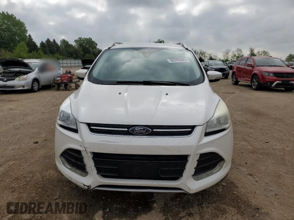 2014 Ford Escape Titanium с VIN 1FMCU0J93EUC35437, выставлен на аукционе Copart как лот 56299395 с пробегом 130 770 миль миль и Списание • Salvage title. История ставок и продаж доступна на DreamBid. Изображение 5.
