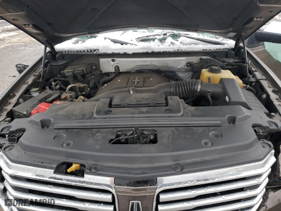 2015 Lincoln Navigator with VIN 5LMJJ2JT7FEJ14653, listed as a Copart auction lot 44921315 with 112,183 mi miles and Salvage Title. Bid and sale history available at carsss.com. Image 13.