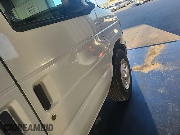 2010 Ford Econoline Cargo Commercial with VIN 1FTNE2EW4ADA72071, listed as a IAAI auction lot 42636413 with 186,263 mi miles and . Bid and sale history available at DreamBid. Image 9.