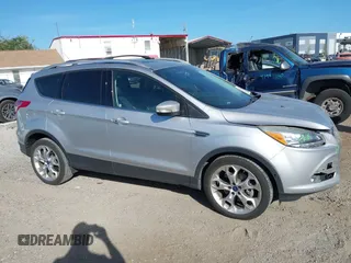 2016 Ford Escape Titanium with VIN 1FMCU0J94GUB11776, listed as a IAAI auction lot 41945655 with 119,949 mi miles. Bid and sale history available at carsss.com. Image 13.