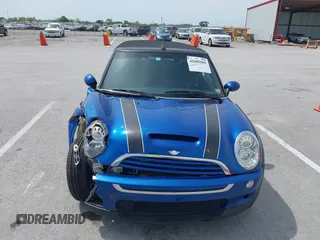 2006 MINI Convertible S with VIN WMWRH335X6TK59110, listed as a IAAI auction lot 42089085 with 101,303 mi miles and . Bid and sale history available at DreamBid. Image 12.