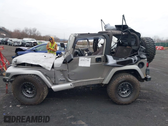 2001 Jeep Wrangler Sport with VIN 1J4FA49S41P355646, listed as a IAAI auction lot 41937746 with 160,634 mi miles. Bid and sale history available at carsss.com. Image 14.