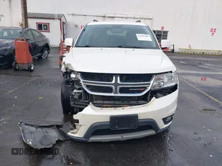 2014 Dodge Journey SXT with VIN 3C4PDCBGXET182430, listed as a IAAI auction lot 41599489 with 143,889 mi miles. Bid and sale history available at carsss.com. Image 12.