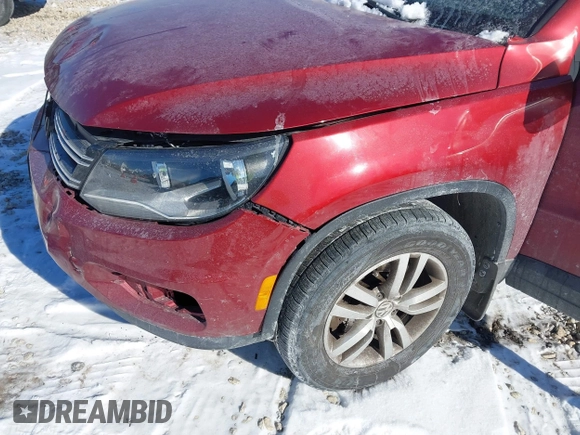 2013 Volkswagen Tiguan S with VIN WVGAV3AX2DW063067, listed as a IAAI auction lot 41638749 with 150,115 mi miles and . Bid and sale history available at DreamBid. Image 13.