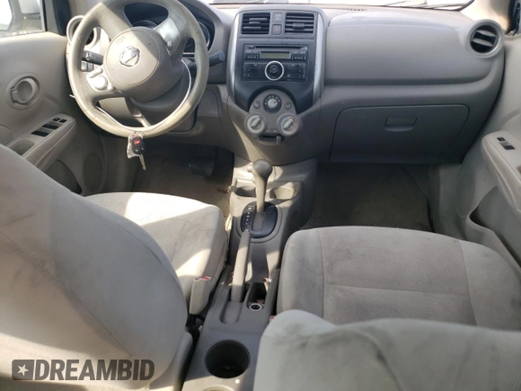 2012 Nissan Versa SV with VIN 3N1CN7AP7CL825501, listed as a Copart auction lot 63093735 with 129,227 mi miles and Salvage title. Bid and sale history available at DreamBid. Image 8.