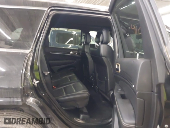 2014 Jeep Grand Cherokee Overland with VIN 1C4RJFCG8EC177899, listed as a IAAI auction lot 41695290 with 200,867 mi miles and . Bid and sale history available at DreamBid. Image 8.