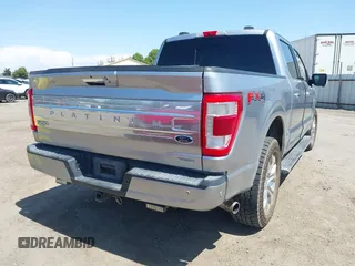 2021 Ford F-150 XL with VIN 1FTFW1E81MFA28258, listed as a IAAI auction lot 42402411 with 119,492 mi miles and . Bid and sale history available at DreamBid. Image 4.