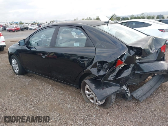 2010 Kia Forte EX with VIN KNAFU4A28A5050734, listed as a IAAI auction lot 42063165 with 179,284 mi miles. Bid and sale history available at carsss.com. Image 3.