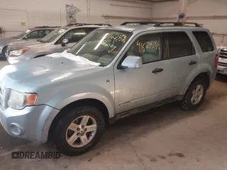 2008 Ford Escape Hybrid with VIN 1FMCU49H58KC63839, listed as a IAAI auction lot 41623596 with 218,566 mi miles and . Bid and sale history available at DreamBid. Image 2.