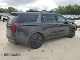 2025 Kia Carnival SX with VIN KNDNE5K37S6490478, listed as a Copart auction lot 51389565 with 6,929 mi miles and Salvage Title. Bid and sale history available at DreamBid. Image 3.