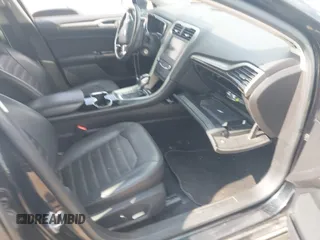 2015 Ford Fusion SE z VIN 3FA6P0HD4FR126292, wystawiony jako IAAI lot #42418564 z przebiegiem 152 795 mil mil oraz . Historia ofert i sprzedaży dostępna na DreamBid. Obrazek 5.