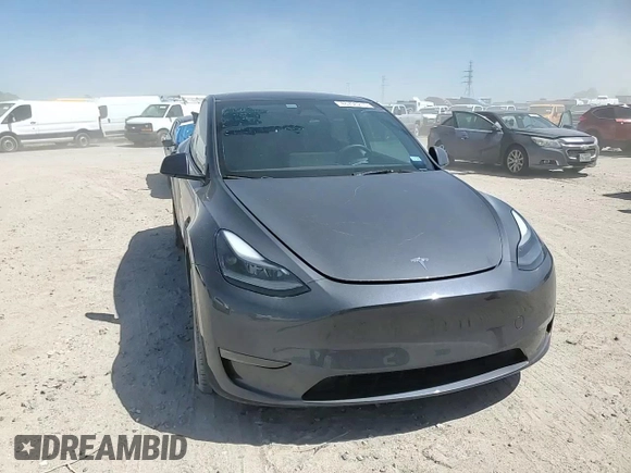 2023 Tesla Model Y Long Range z VIN 7SAYGDEE8PA185193, wystawiony jako Copart lot #48706215 z przebiegiem 10 451 mil mil oraz Szkoda całkowita • Salvage title. Historia ofert i sprzedaży dostępna na DreamBid. Obrazek 10.