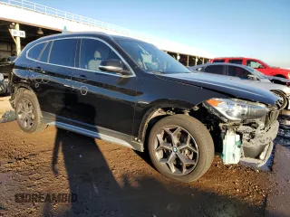 2018 BMW X1 xDrive28i with VIN WBXHT3C37J3H32374, listed as a Copart auction lot 70226702 with 65,796 mi miles. Bid and sale history available at carsss.com. Image 4.