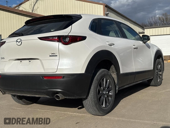 2021 Mazda CX-30 S with VIN 3MVDMAAL8MM226907, listed as a Copart auction lot 53000045 with 29,496 mi miles and Salvage Title. Bid and sale history available at DreamBid. Image 4.
