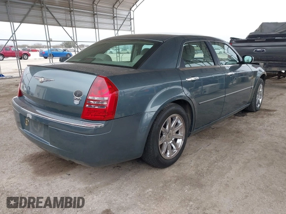 2006 Chrysler 300 C with VIN 2C3KA63H66H318725, listed as a IAAI auction lot 41629398 with 157,367 mi miles. Bid and sale history available at carsss.com. Image 4.