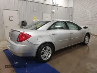 2006 Pontiac G6 6-Cyl z VIN 1G2ZG558764174412, wystawiony jako Copart lot #45677485 z przebiegiem 286 524 mil mil oraz Czysty tytuł • Clean title. Historia ofert i sprzedaży dostępna na DreamBid. Obrazek 3.