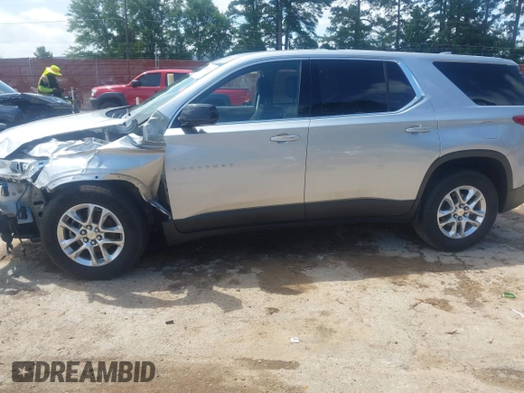 2020 Chevrolet Traverse LS z VIN 1GNERFKW3LJ271902, wystawiony jako IAAI lot #42516114 z przebiegiem 89 879 mil mil oraz . Historia ofert i sprzedaży dostępna na DreamBid. Obrazek 14.