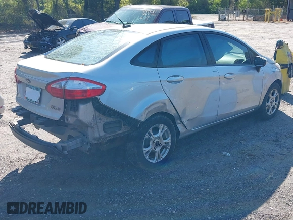 2016 Ford Fiesta SE with VIN 3FADP4BJ7GM110714, listed as a IAAI auction lot 41989876 with Not Provided miles and . Bid and sale history available at DreamBid. Image 4.
