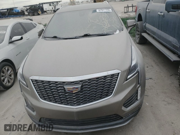 2022 Cadillac XT5 FWD Premium Luxury z VIN 1GYKNCRS1NZ126722, wystawiony jako Copart lot #87977755 z przebiegiem Nie podano mil oraz Nie do naprawy • Non repairable. Historia ofert i sprzedaży dostępna na DreamBid. Obrazek 5.