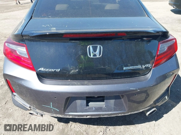 2016 Honda Accord Touring with VIN 1HGCT2B0XGA000686, listed as a IAAI auction lot 41888593 with 174,934 mi miles and . Bid and sale history available at DreamBid. Image 16.