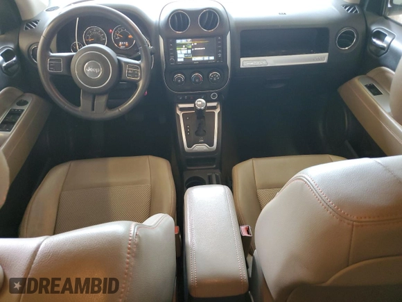 2014 Jeep Compass Latitude with VIN 1C4NJDEB1ED661332, listed as a Copart auction lot 53958985 with 116,020 mi miles and Salvage Title. Bid and sale history available at DreamBid. Image 8.