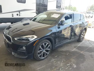 2018 BMW X2 sDrive28i with VIN WBXYJ3C32JEJ84291, listed as a IAAI auction lot 42575234 with 65,081 mi miles and . Bid and sale history available at DreamBid. Image 2.