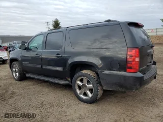 2011 Chevrolet Suburban LT with VIN 1GNSKJE33BR389346, listed as a Copart auction lot 48250195 with 217,815 mi miles and Salvage Title. Bid and sale history available at carsss.com. Image 2.