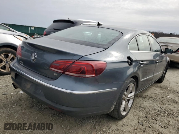 2013 Volkswagen CC VR6 Lux with VIN WVWHU7AN6DE509321, listed as a Copart auction lot 47990795 with 441,969 mi miles and Salvage Title. Bid and sale history available at carsss.com. Image 3.