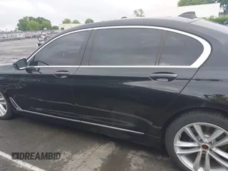 2018 BMW 7 Series 750i z VIN WBA7F0C59JGM23945, wystawiony jako IAAI lot #42236737 z przebiegiem 65 576 mil mil oraz . Historia ofert i sprzedaży dostępna na DreamBid. Obrazek 14.