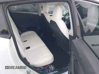 2023 Tesla Model Y Performance with VIN 7SAYGDEFXPF589477, listed as a IAAI auction lot 41936981 with 28,993 mi miles and . Bid and sale history available at DreamBid. Image 8.