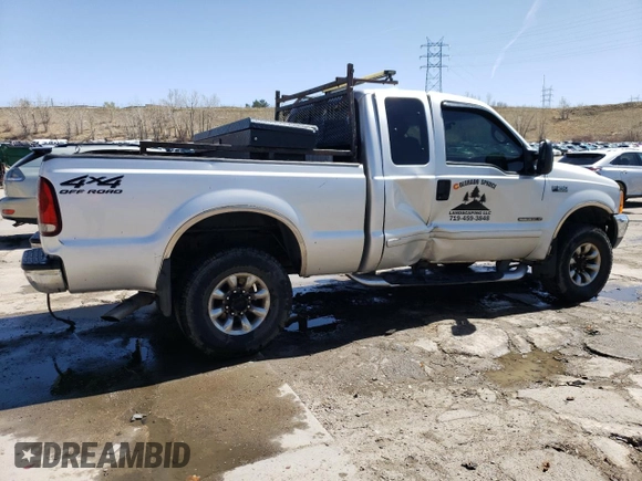 2001 Ford F-250 XL with VIN 1FTNX21F11ED05348, listed as a Copart auction lot 52098155 with 217,678 mi miles and Salvage Title. Bid and sale history available at DreamBid. Image 3.