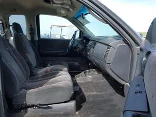 2001 Dodge Dakota with VIN 1B7GL22X11S284210, listed as a IAAI auction lot 41630417 with 206,484 mi miles. Bid and sale history available at carsss.com. Image 5.