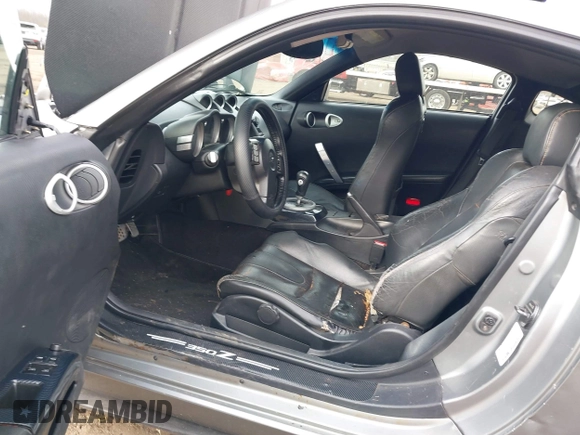 2003 Nissan 350Z Touring z VIN JN1AZ34E33T003711, wystawiony jako IAAI lot #41351191 z przebiegiem 167 503 mil mil oraz . Historia ofert i sprzedaży dostępna na DreamBid. Obrazek 5.