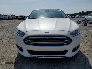 2014 Ford Fusion SE Hybrid with VIN 3FA6P0LU1ER308330, listed as a Copart auction lot 63375405 with 177,507 mi miles and Salvage title. Bid and sale history available at DreamBid. Image 5.