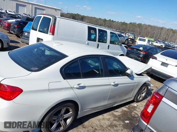 2013 BMW 3 Series 320i with VIN WBA3B1C56DF462549, listed as a IAAI auction lot 41411287 with 119,146 mi miles. Bid and sale history available at carsss.com. Image 13.