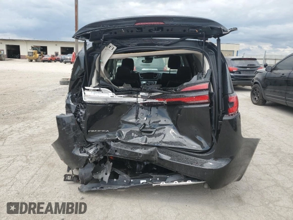 2023 Chrysler Pacifica Touring L with VIN 2C4RC1BG4PR621126, listed as a Copart auction lot 56694085 with 42,659 mi miles and Salvage title. Bid and sale history available at DreamBid. Image 6.