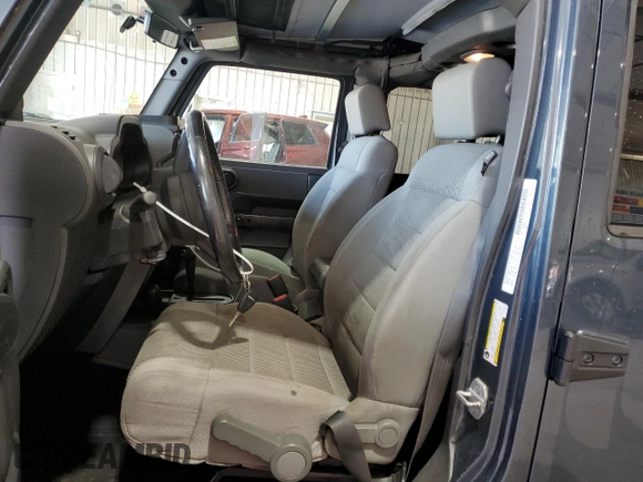 2007 Jeep Wrangler Unlimited Sahara с VIN 1J8GA591X7L217299, выставлен на аукционе Copart как лот 61984395 с пробегом 151 171 миль миль и Списание • Salvage title. История ставок и продаж доступна на DreamBid. Изображение 7.