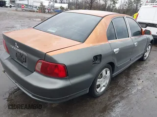 2003 Mitsubishi Galant ES with VIN 4A3AA46G83E136877, listed as a IAAI auction lot 41469411 with 307,492 mi miles. Bid and sale history available at carsss.com. Image 4.