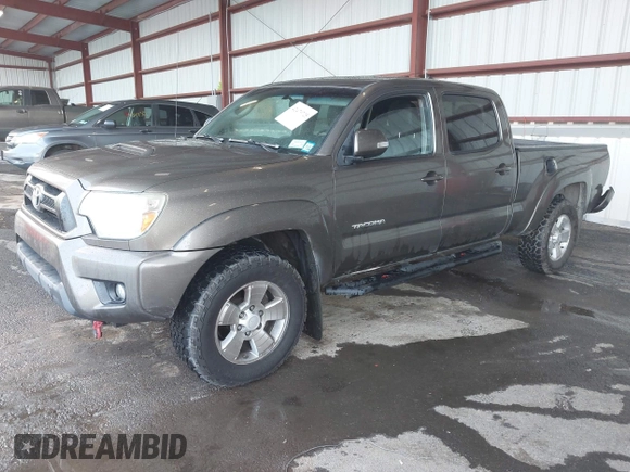 2014 Toyota Tacoma with VIN 3TMMU4FN4EM072128, listed as a IAAI auction lot 42479725 with 287,877 mi miles and . Bid and sale history available at DreamBid. Image 2.