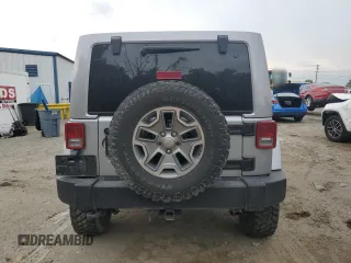 2018 Jeep Wrangler Unlimited Rubicon Recon z VIN 1C4HJWFGXJL840598, wystawiony jako Copart lot #59399595 z przebiegiem 63 298 mil mil oraz Szkoda całkowita • Salvage title. Historia ofert i sprzedaży dostępna na DreamBid. Obrazek 6.