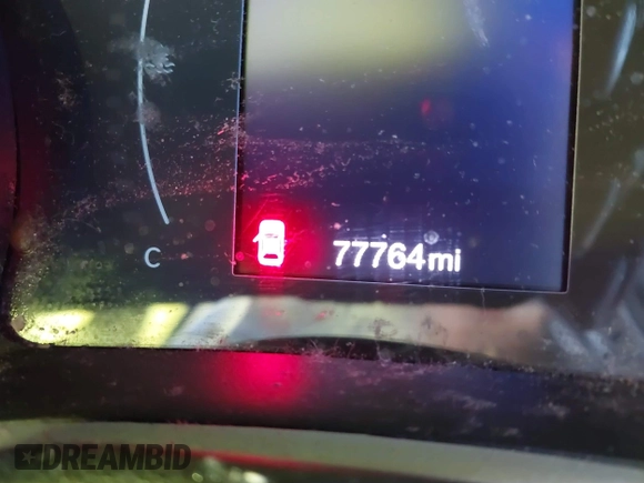 2020 Jeep Compass Latitude with VIN 3C4NJCBB4LT177001, listed as a IAAI auction lot 41210982 with 77,764 mi miles and . Bid and sale history available at DreamBid. Image 14.