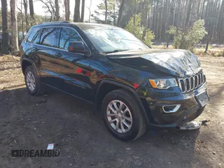 2021 Jeep Grand Cherokee Laredo X with VIN 1C4RJFAG2MC701632, listed as a IAAI auction lot 41177053 with 30,314 mi miles and . Bid and sale history available at DreamBid. Image 1.