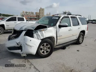 2007 GMC Yukon SLT with VIN 1GKFC13J57J102091, listed as a Copart auction lot 60910275 with 130,028 mi miles and Salvage title. Bid and sale history available at DreamBid. Image 1.