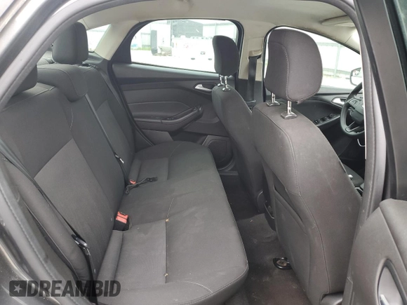 2018 Ford Focus SE z VIN 1FADP3FE1JL220741, wystawiony jako Copart lot #53755735 z przebiegiem Nie podano mil oraz Czysty tytuł • Clean title. Historia ofert i sprzedaży dostępna na DreamBid. Obrazek 10.
