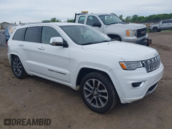 2017 Jeep Grand Cherokee Overland with VIN 1C4RJFCG6HC941771, listed as a IAAI auction lot 42356577 with 192,318 mi miles and . Bid and sale history available at DreamBid. Image 1.