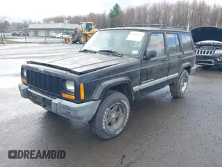 1999 Jeep Cherokee Sport with VIN 1J4FF68SXXL649633, listed as a IAAI auction lot 41992258 with 121,042 mi miles. Bid and sale history available at carsss.com. Image 2.
