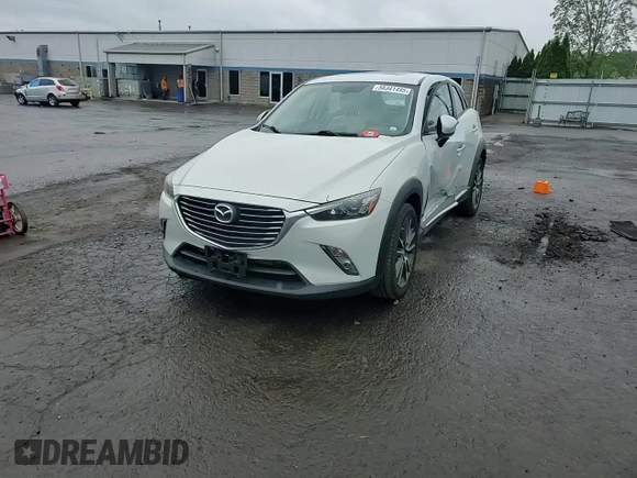 2016 Mazda CX-3 Grand Touring z VIN JM1DKBD77G0105451, wystawiony jako Copart lot #58341495 z przebiegiem 109 525 mil mil oraz Szkody całkowita. Historia ofert i sprzedaży dostępna na DreamBid. Obrazek 13.