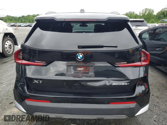 2023 BMW X1 xDrive28i with VIN WBX73EF09P5W64467, listed as a Copart auction lot 58586875 with 29,022 mi miles and Salvage title. Bid and sale history available at DreamBid. Image 6.